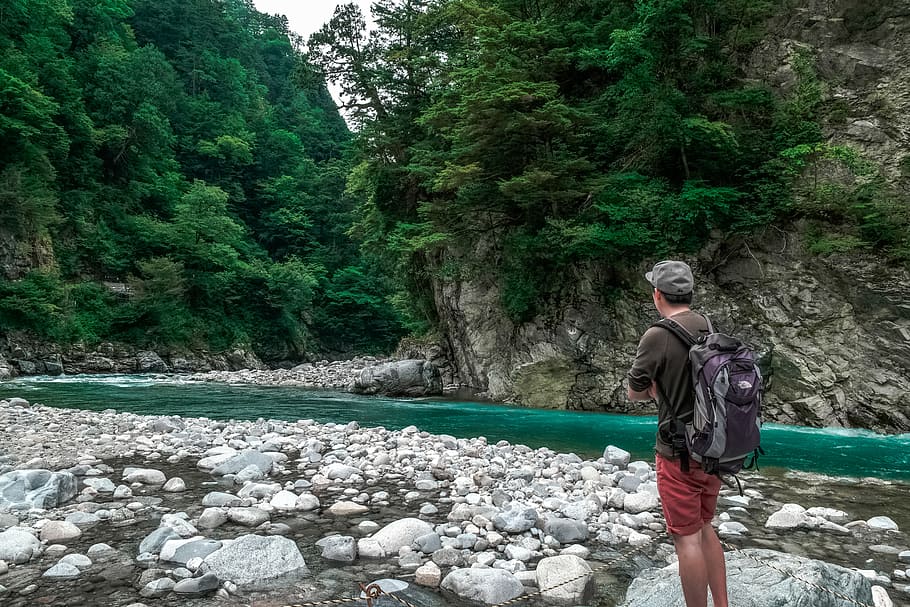 nature, person, rocks, trees, backpack, cascade, cliff, creek HD wallpaper