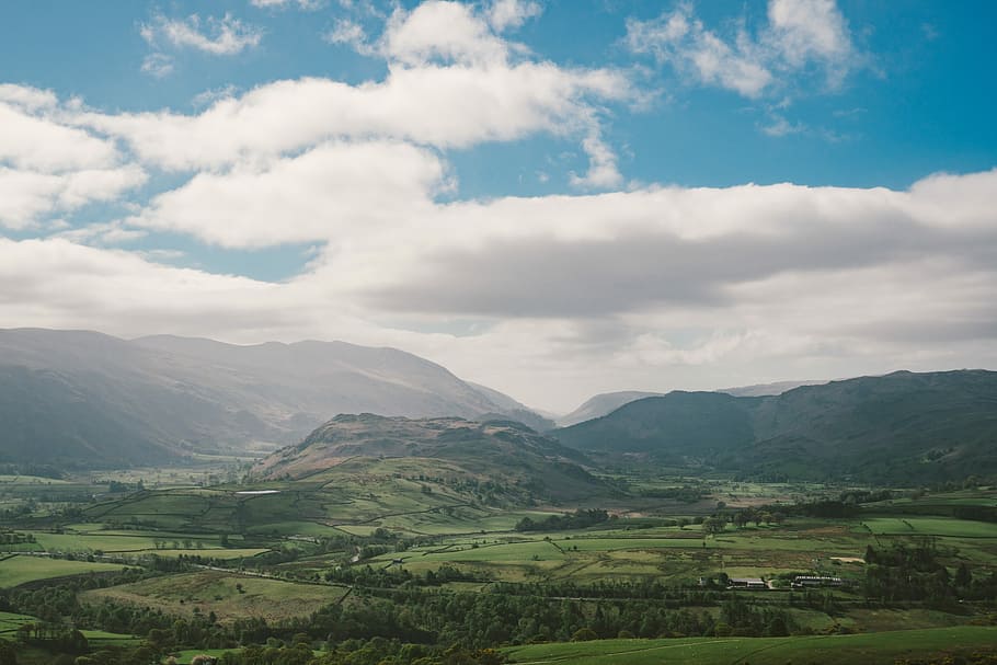 mountains under cloudy sky, landscape photography of green leafed trees under cloudy sky during daytime HD wallpaper