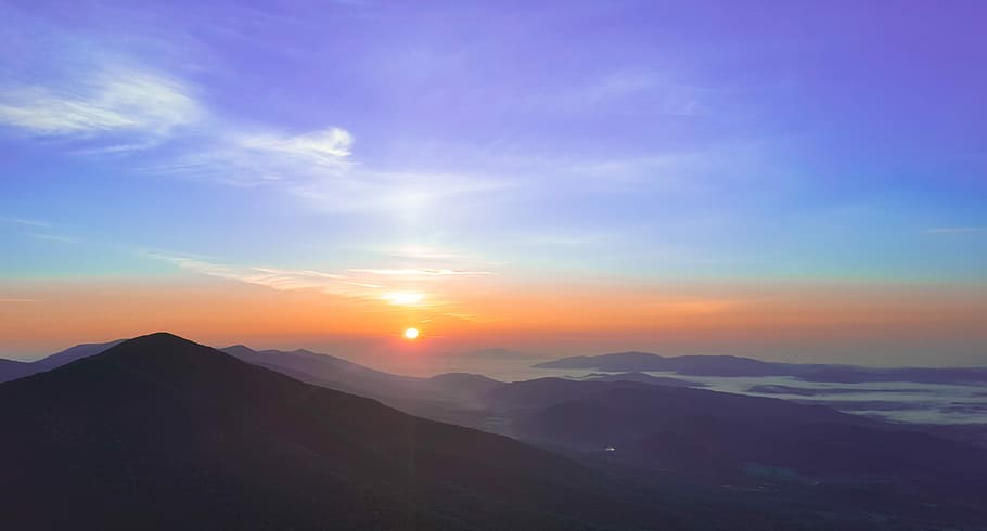 silhouette of mountains during sunset, mountains under blue skies HD wallpaper