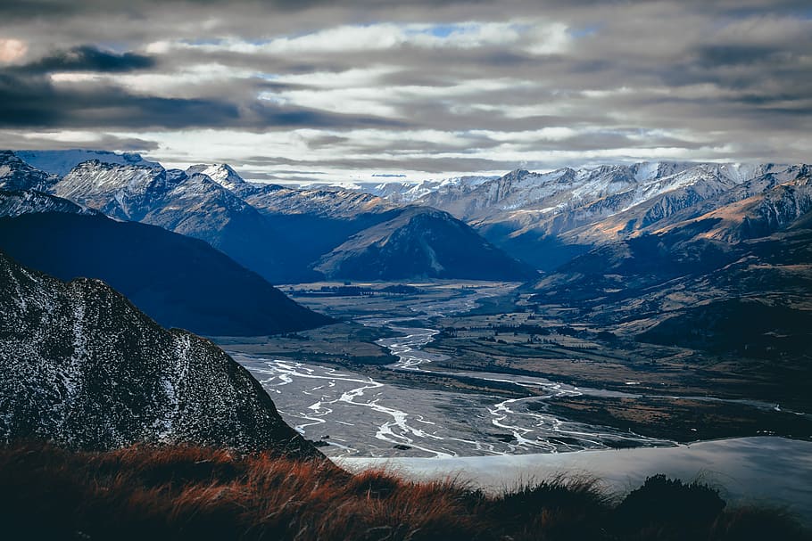 river between mountains, aerial photo of snow covered mountains HD wallpaper