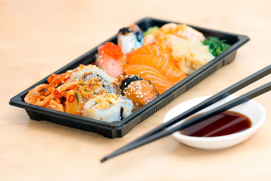 Closeup shot of sushi fish and chopsticks, food/Drink, seafood