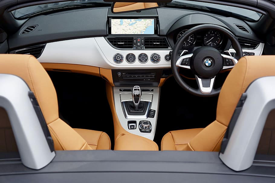 black, white, and beige BMW car dashboard, transportation system