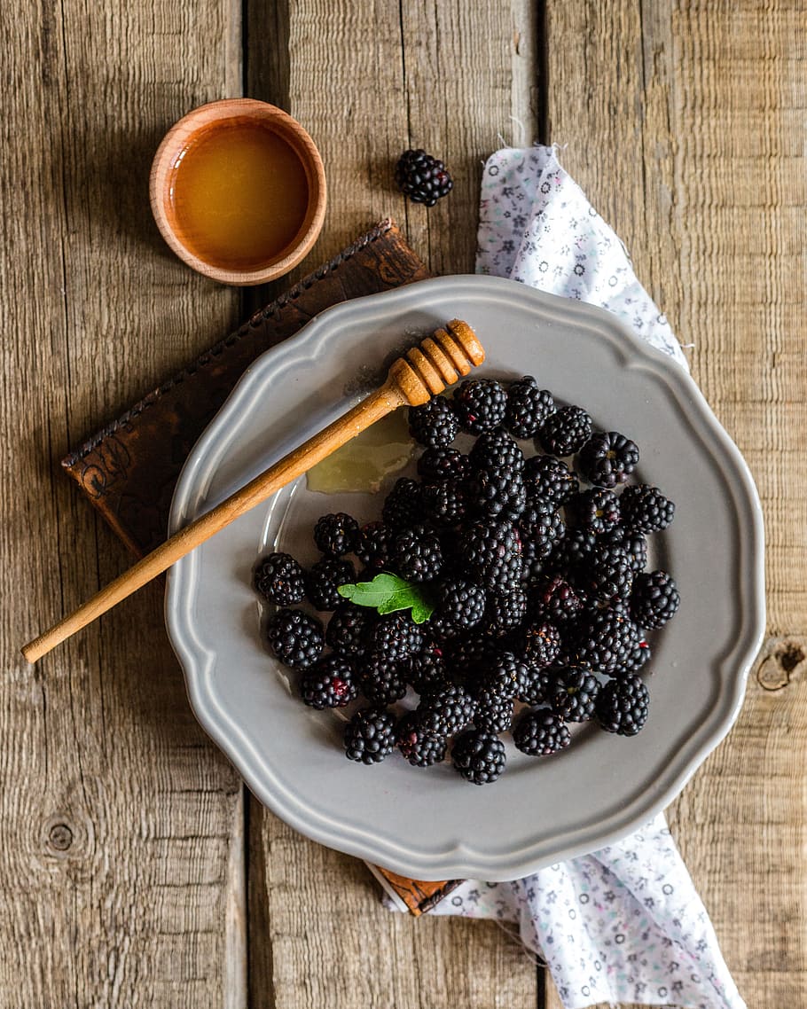 black berries on white ceramic plate on brown table top, honey, HD wallpaper
