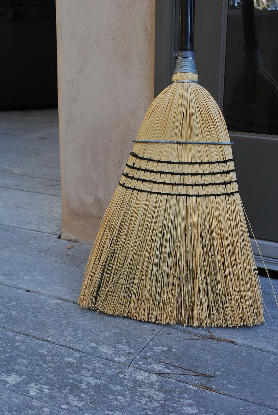 Image of Bed cleaning broom on black background.-BM827999-Picxy