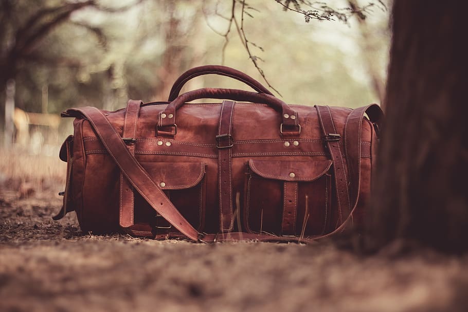 handbag, leather, brown, blur, tree, selective focus, land HD wallpaper