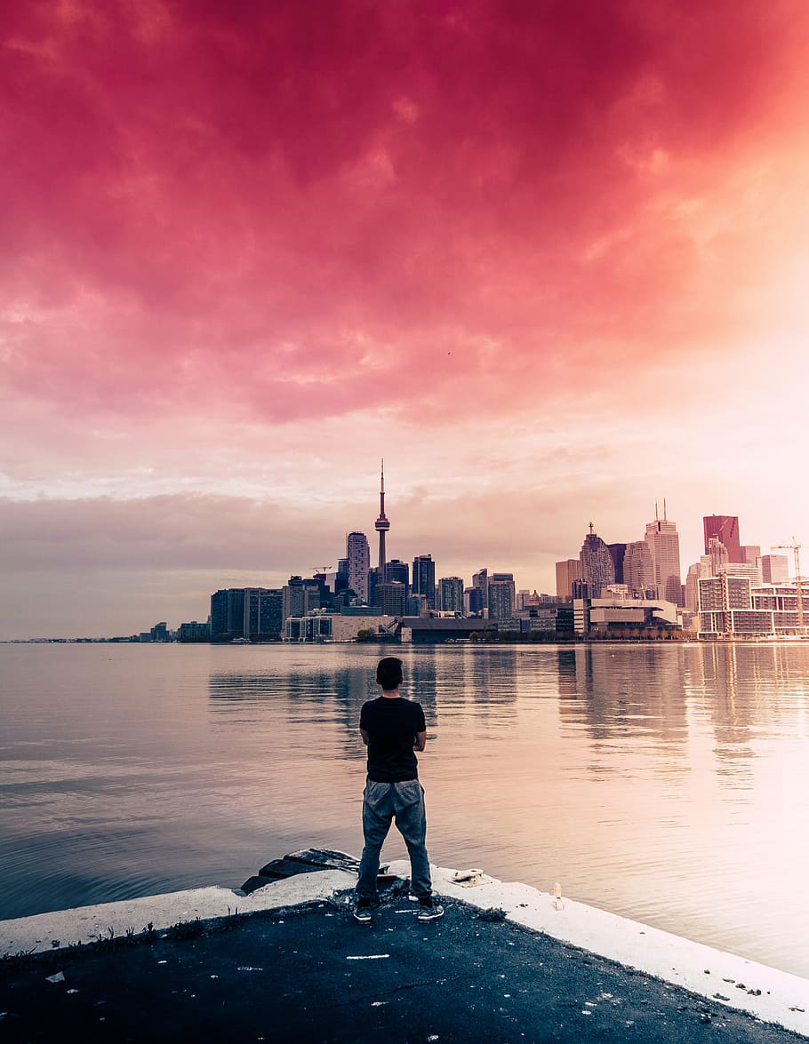 man standing near body of water, architecture, buildings, infrastructure HD wallpaper