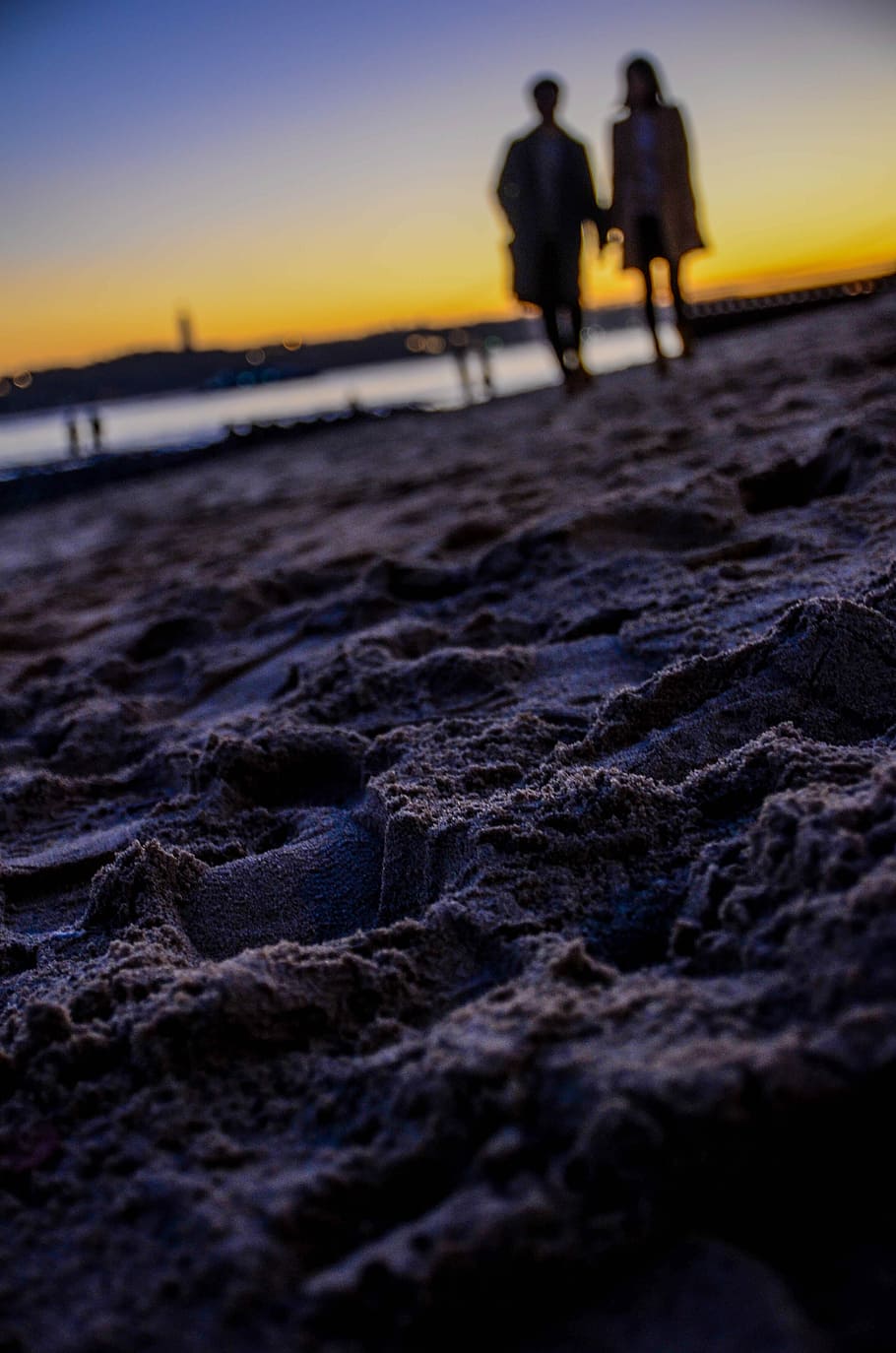 lost in lisbon, selective-focus photography of sand, beach, couple HD wallpaper