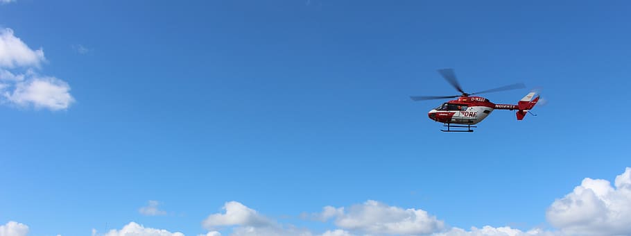 red and white helicopter flying on sky, clouds, use, doctor on call HD wallpaper