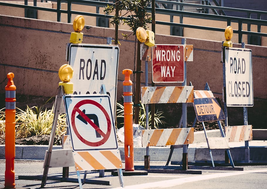 assorted-color signage lot on road during daytime, assorted street signage HD wallpaper