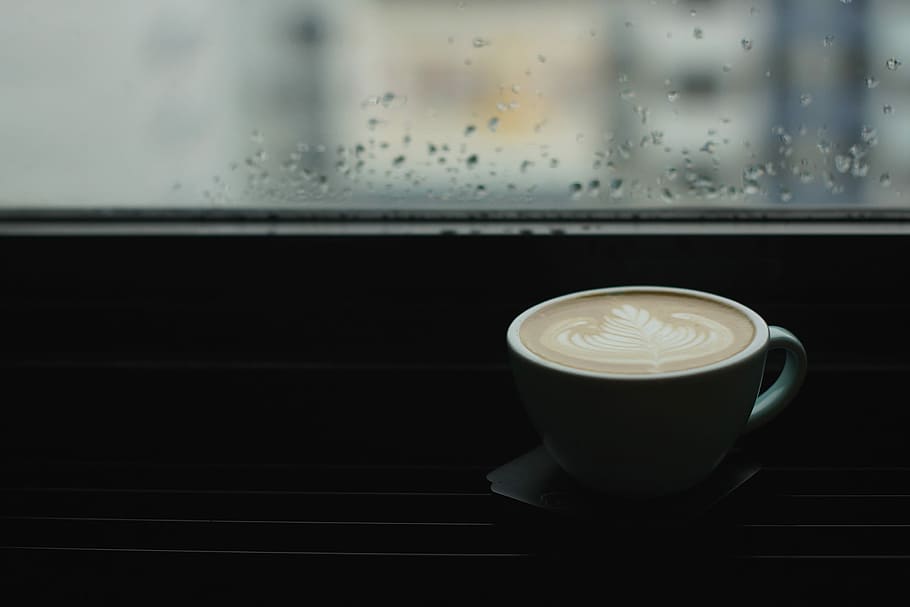 blue ceramic teacup beside window pane, white mug filled coffee with coffee-art HD wallpaper