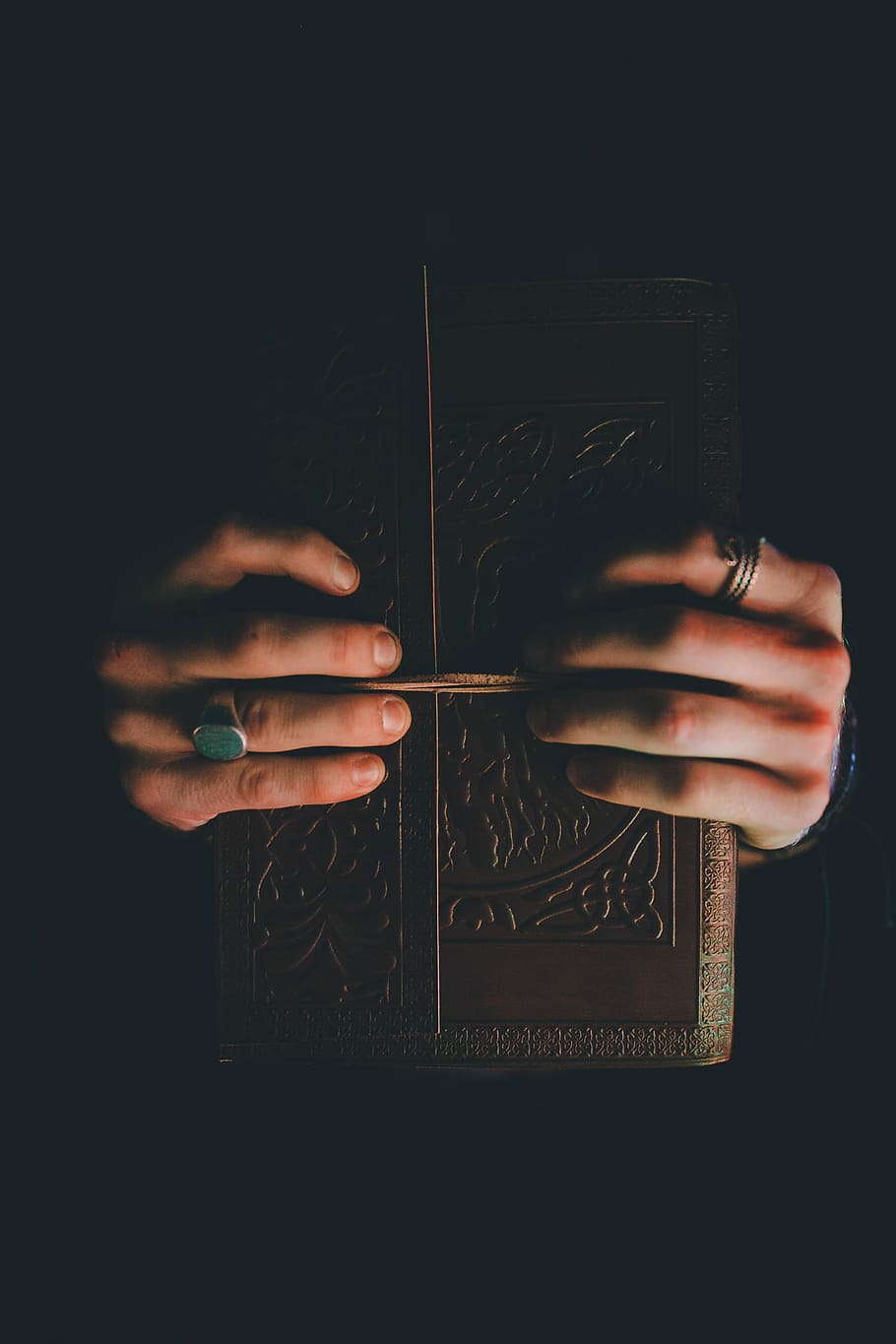 person holding hardbound book, person holding book, symbolism HD wallpaper