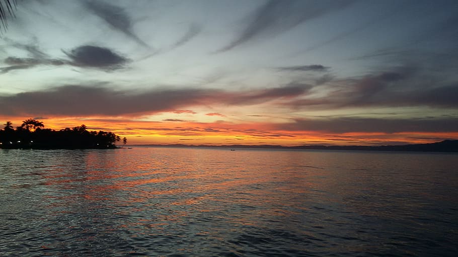 silhouette photo of island near body of wa, sunset, caribbean HD wallpaper