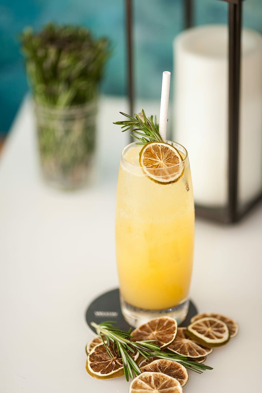 pineapple juice on white wooden surface, lemon juice on clear drinking glass HD wallpaper