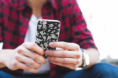 person holding iPhone with black and gray case, people, man HD wallpaper