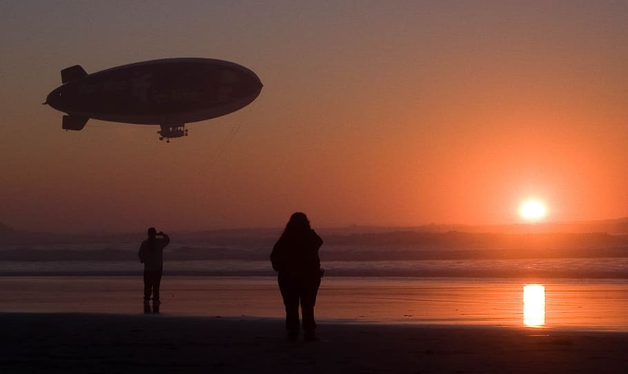 blimp, beach, evening, sunset, sky, water, sea, orange color HD wallpaper