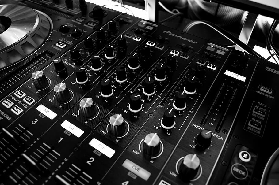 grayscale photography of black DJ controller, table, music, power