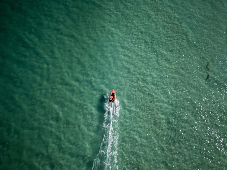 aerial photo of person riding kayak on bodies of water during daytime, bird's eye view of red and white personal watercraft, HD wallpaper
