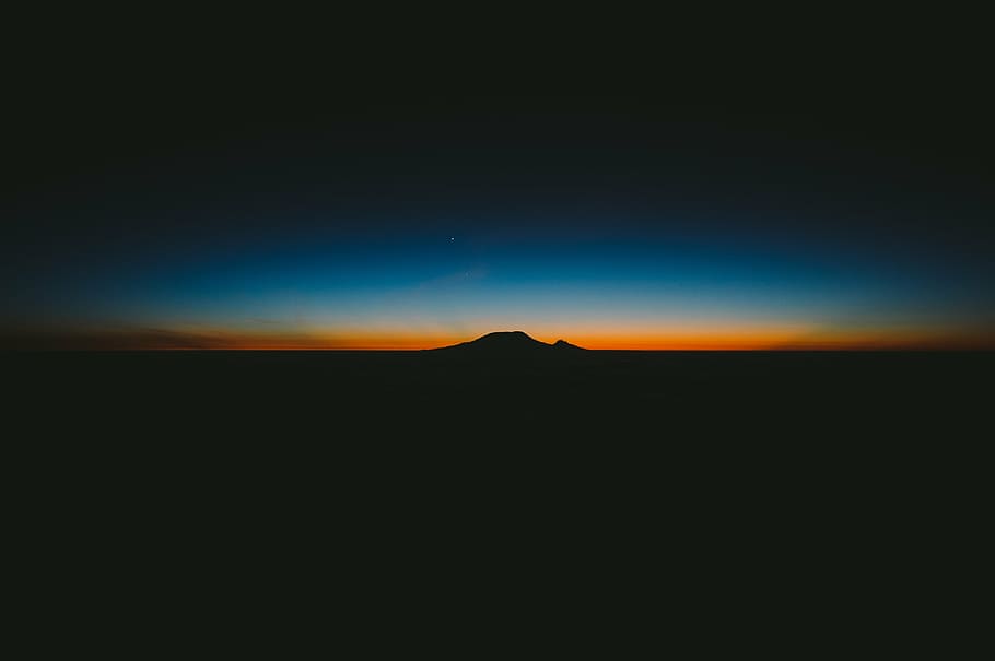 silhouette of mountain during night, sunset, horizon, fading light