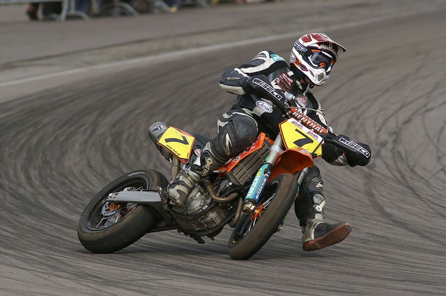 man riding on motocross dirt bike, supermoto, hurry, race, track