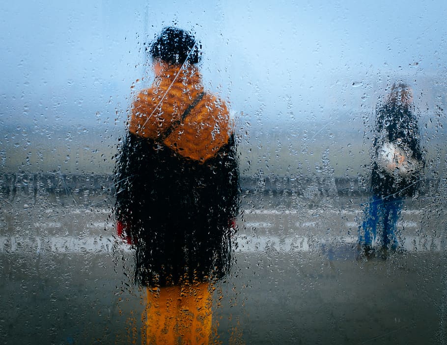 person standing near person in black top, persons, rain, weather HD wallpaper