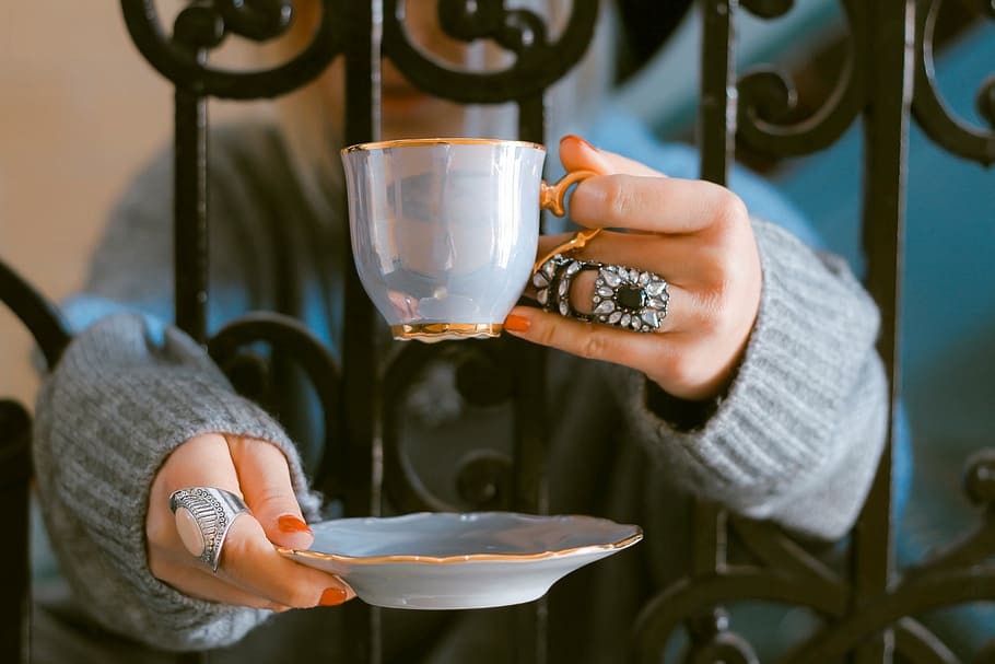 woman holding blue ceramic cup and saucer, plate, rings, hands HD wallpaper