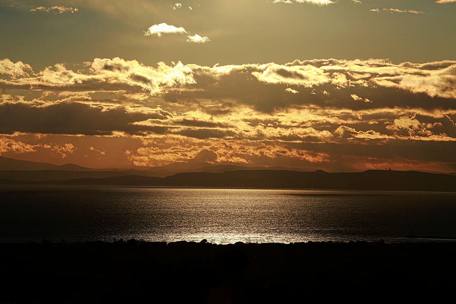 sun, lying, sunset, light, clouds, evening, landscape, sea HD wallpaper
