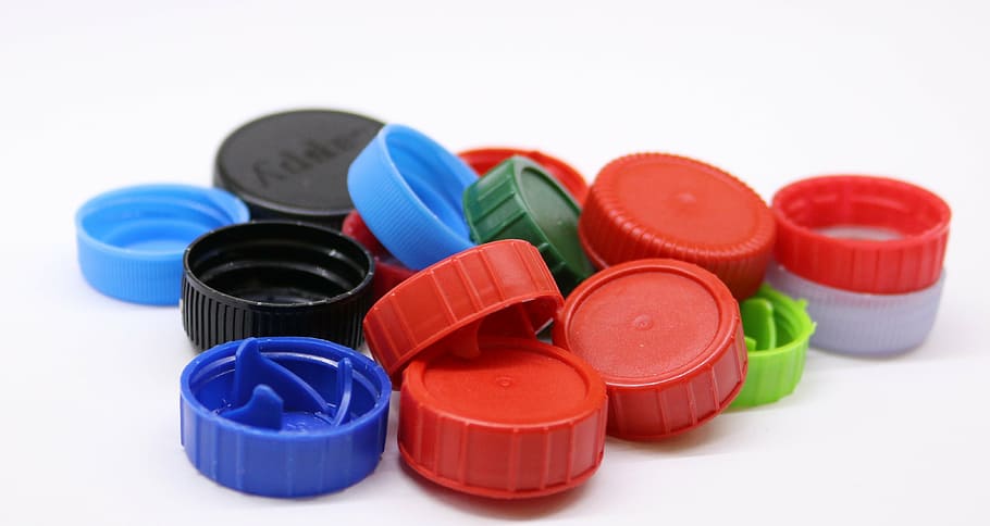 assorted-color lid lot, plastic screw caps, garbage, artificial HD wallpaper