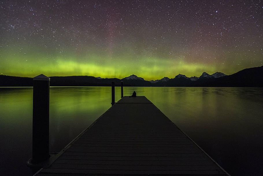 brown dock near body of water, aurora borealis, night, northern lights