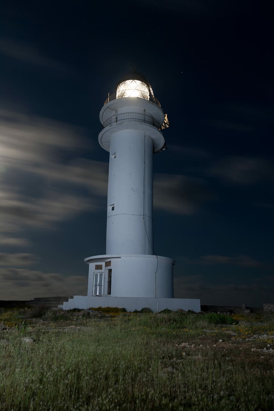white tower house turned on, lighted lighthouse on cliff, building HD wallpaper