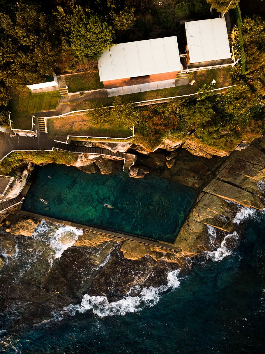 aerial photography of pool resort near ocean, aerial photo of building beside wide swimming pool HD wallpaper