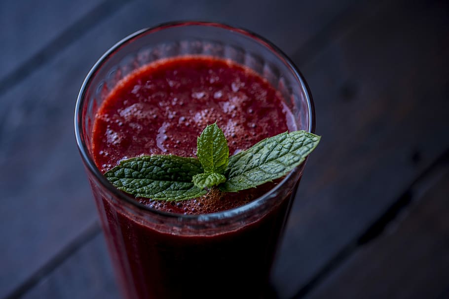 red drink in clear glass, clear drinking glass with red liquid on top of brown surface HD wallpaper