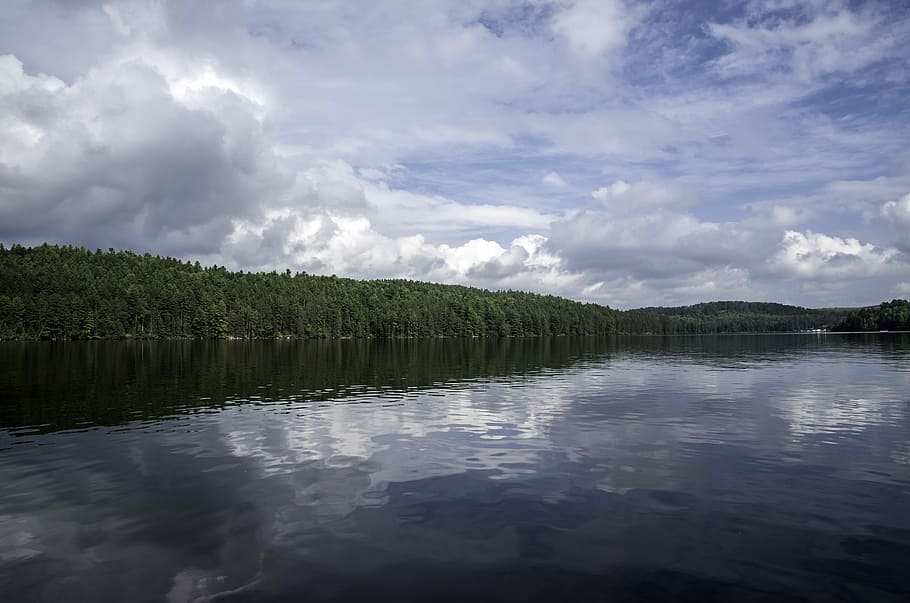 Clouds, lake, water, and trees at Algonquin Provincial Park, Ontario HD wallpaper