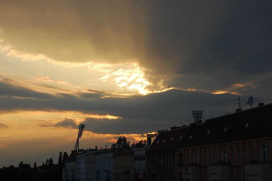 berlin, sun, cloudburst, city, architecture, sky, building exterior HD wallpaper