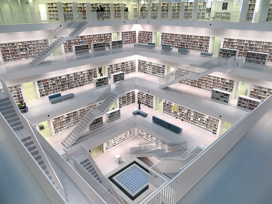 architectural photography of library, stuttgart, white, books