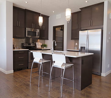 two white and grey barstools beside kitchen island inside kitchen HD wallpaper