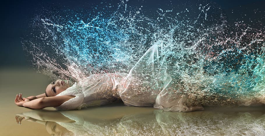 woman lying on floor with water effect painting, desktop background