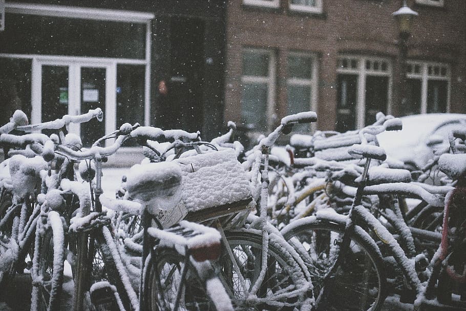 bike parked on street covered with snow, snow covered bicycles on road, HD wallpaper
