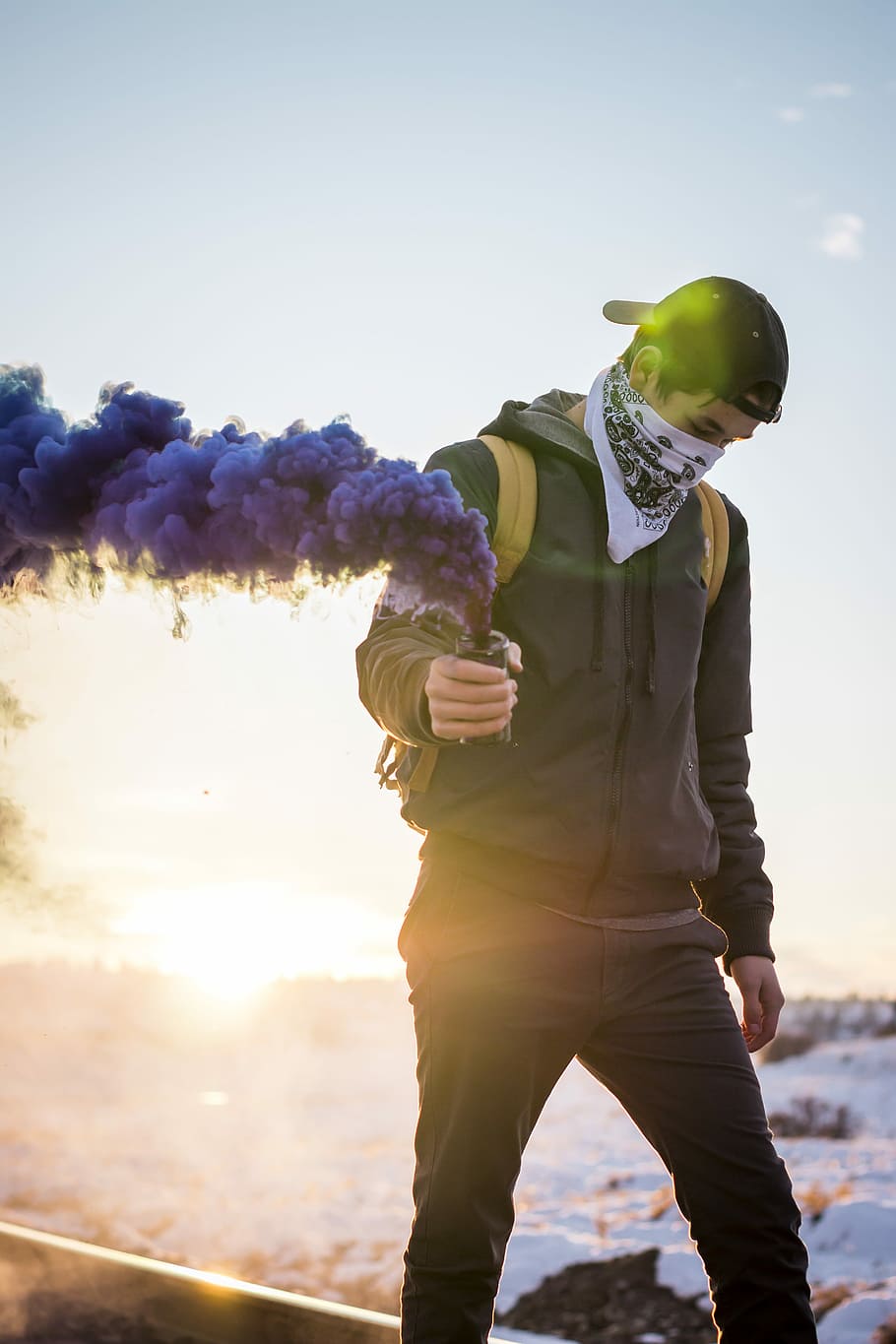 man holding purple flare, person in gray zip-up hoodie holding smoke bomb walking during sunset, HD wallpaper