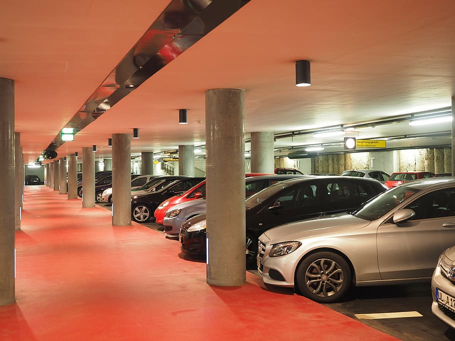 cars parked on parking curb, multi storey car park, park level