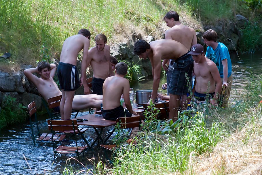 boys, men, footballers, cooling off, river, picnic, food, drink