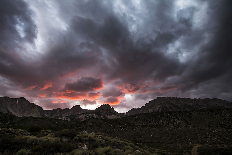 brown mountain under dark sky, mountains at sunset, cloudy, red HD wallpaper