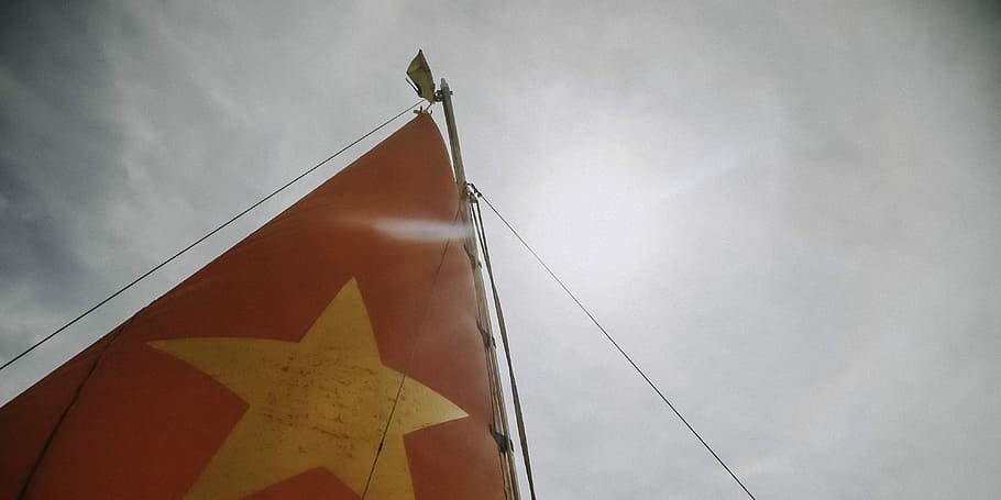 worm's eyeview photo of red and orange sail, untitled, flag, star HD wallpaper