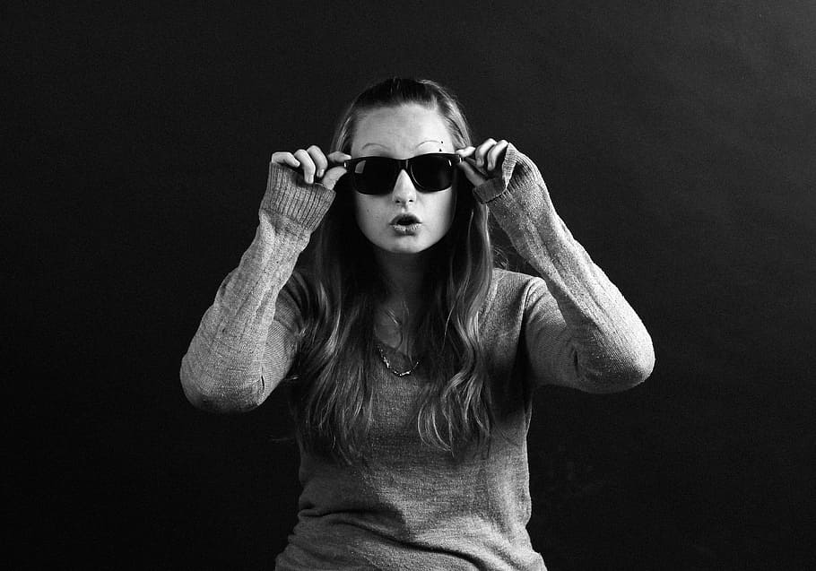 grayscale photography of woman holding sunglasses, girl, one