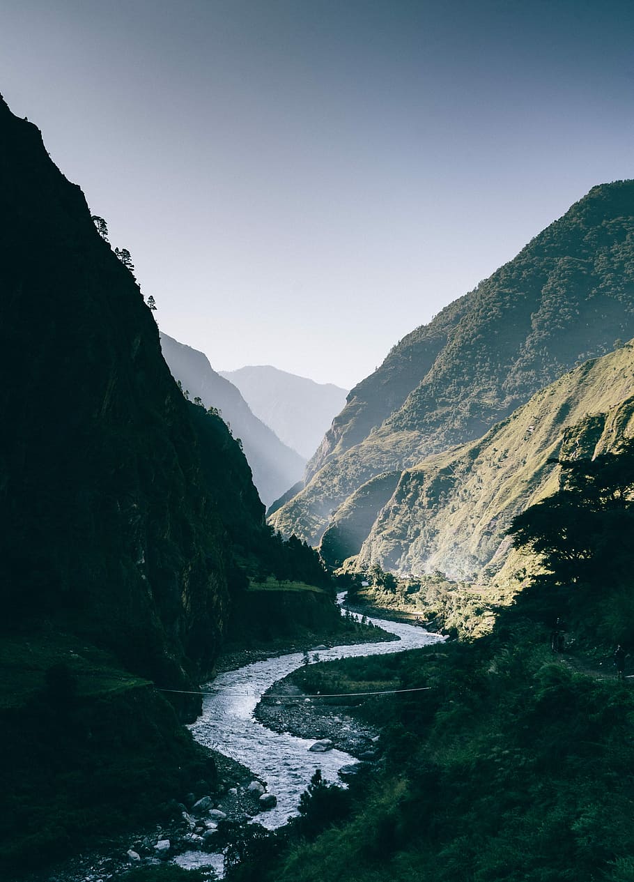 river between mountain at daytime, river in between mountains during daytime HD wallpaper