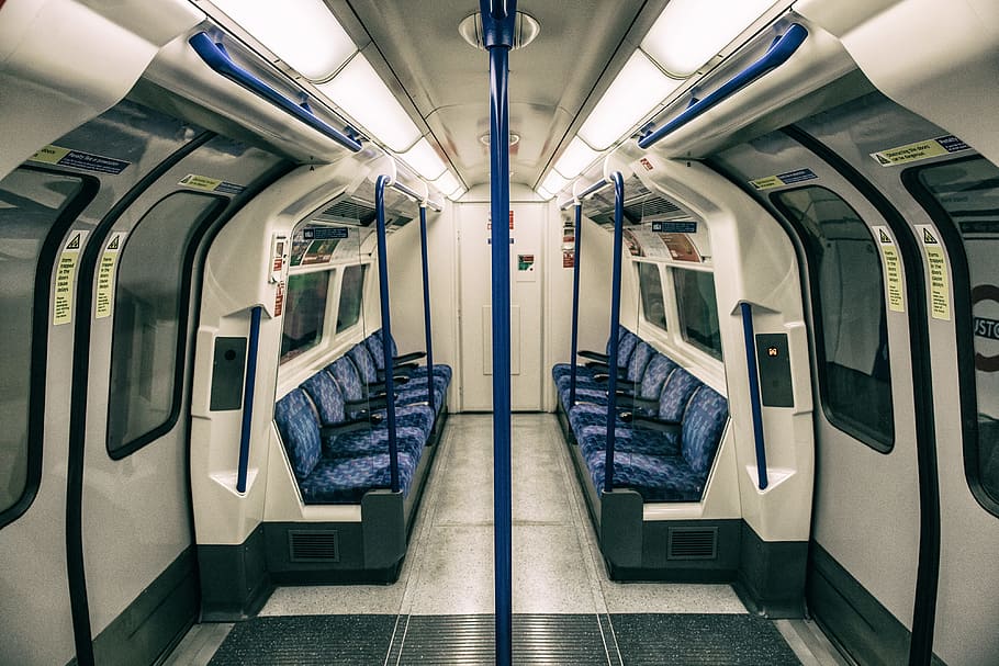 Wide-angle shot of the interior of a train on the London Underground