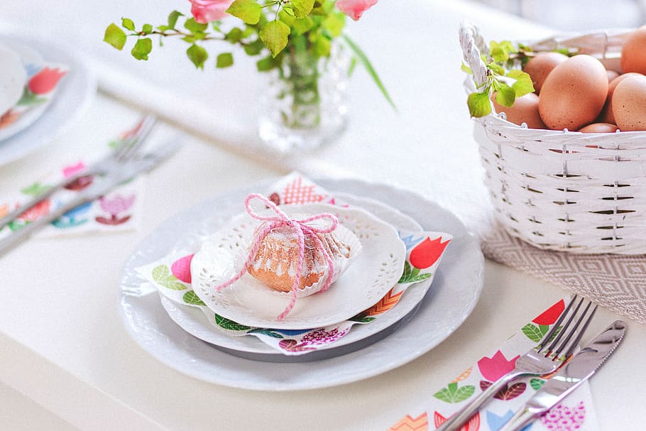 muffin on white ceramic saucer near vase, eggs, baskets, plate HD wallpaper