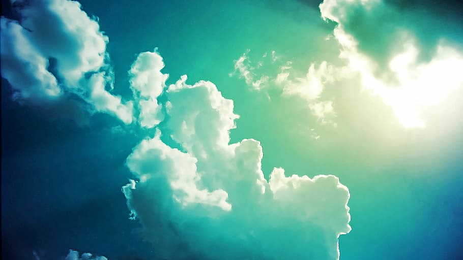 white clouds and blue skies with sunrays, sunlight passing through clouds HD wallpaper