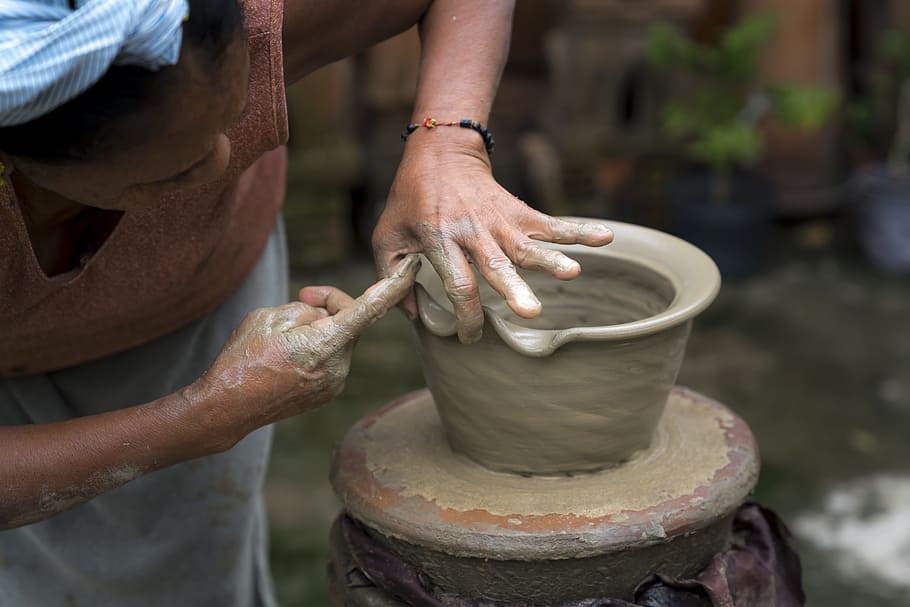 woman making plant pots out of clay, adult, asia, pottery, circle