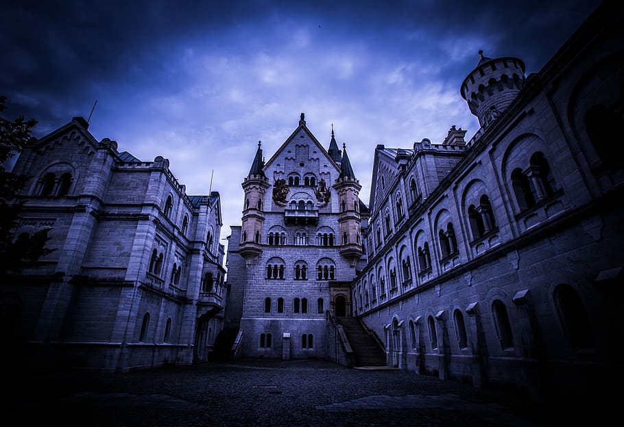 Neuschwanstein Castle, Germany, gray concrete palace under nimbus clouds HD wallpaper
