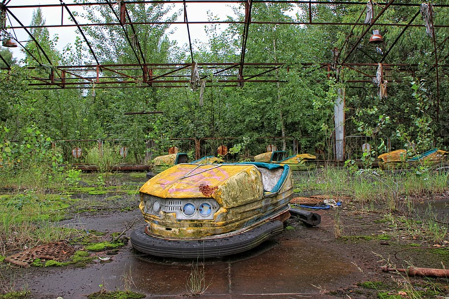 yellow and black vintage bumpcar, pripyat, theme park, fairground